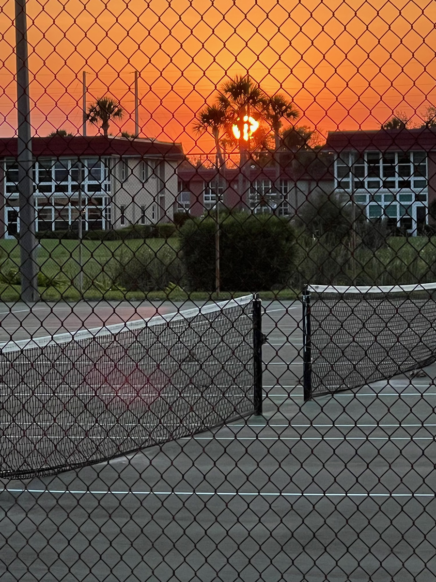 Tennis and pickleball courts at sunset